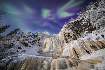 Northern landscape about moonlit icefall with stars and angel-shaped Northern Lights.