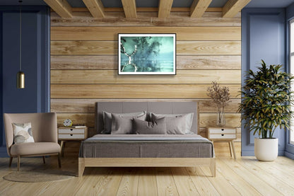 Surreal underwater branches reflecting on surface, framed on wooden bedroom wall above bed.