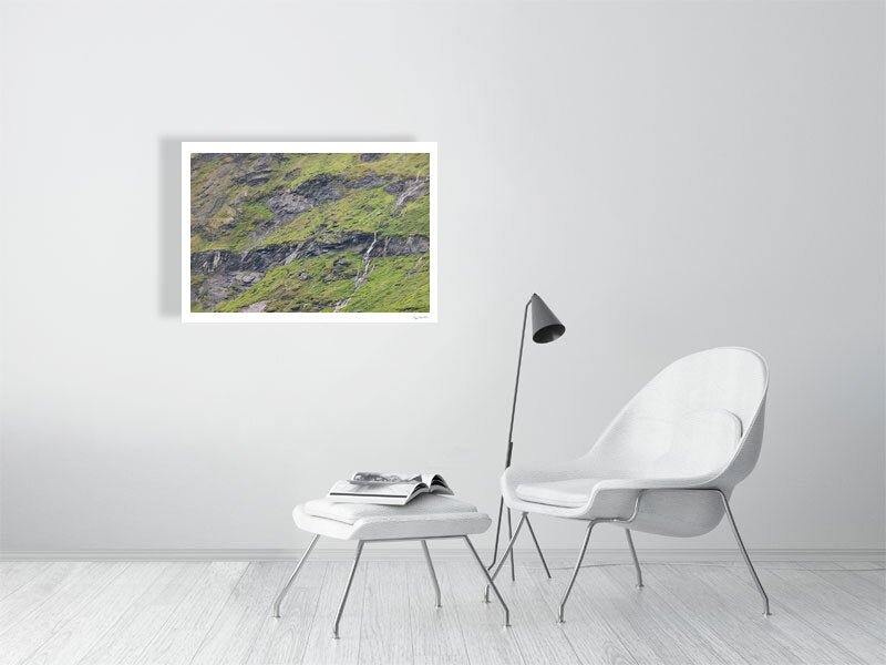 Photo print of meltwater trickling down rocky Norwegian mountain, white living room wall.