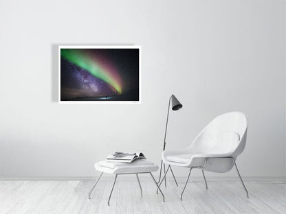 Arctic wilderness aurora Milky Way print, person gazing, white wall.