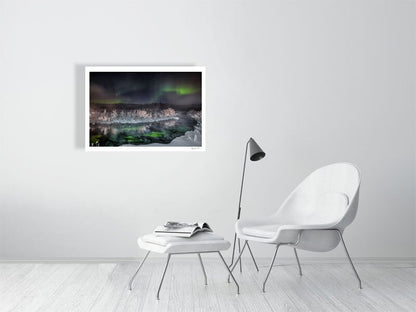 Fine art print of Northern Lights dance above a steaming Arctic river in winter, displayed on white living room wall.