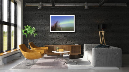 Framed long exposure photo, horses with Northern Lights antlers, black brick living room wall.