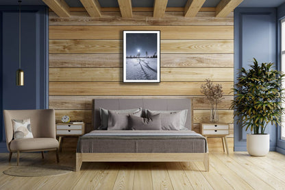 Framed photo of magical winter night in northern marshy forest, wooden bedroom wall.