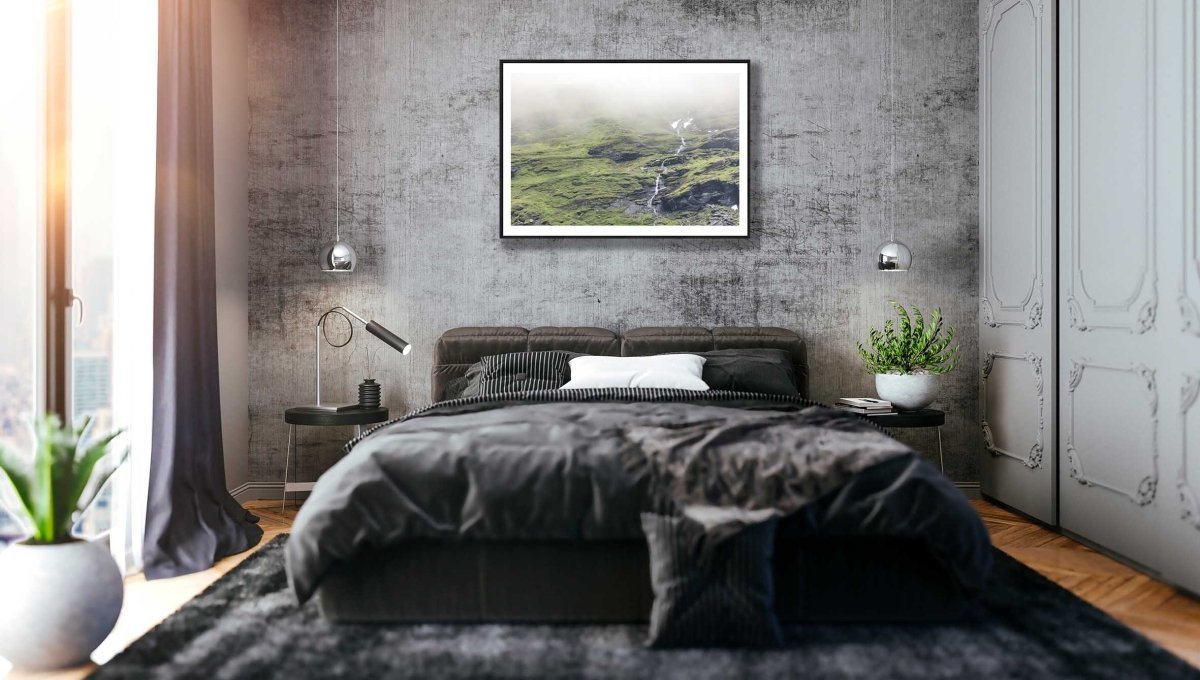 Black-framed Norwegian mountain stream with cloud-covered peak and unmelted snow, grey stone bedroom wall.