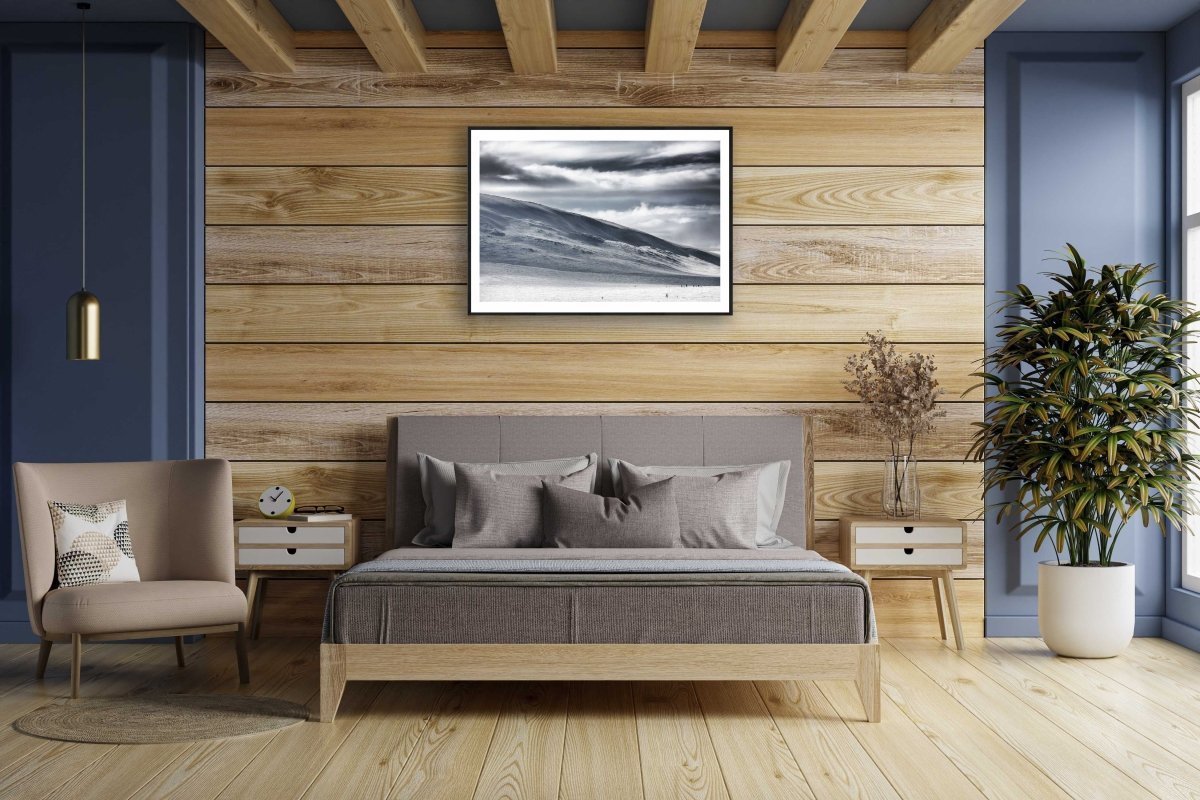 Framed photo of ski hikers in Arctic wilderness, wooden wall.